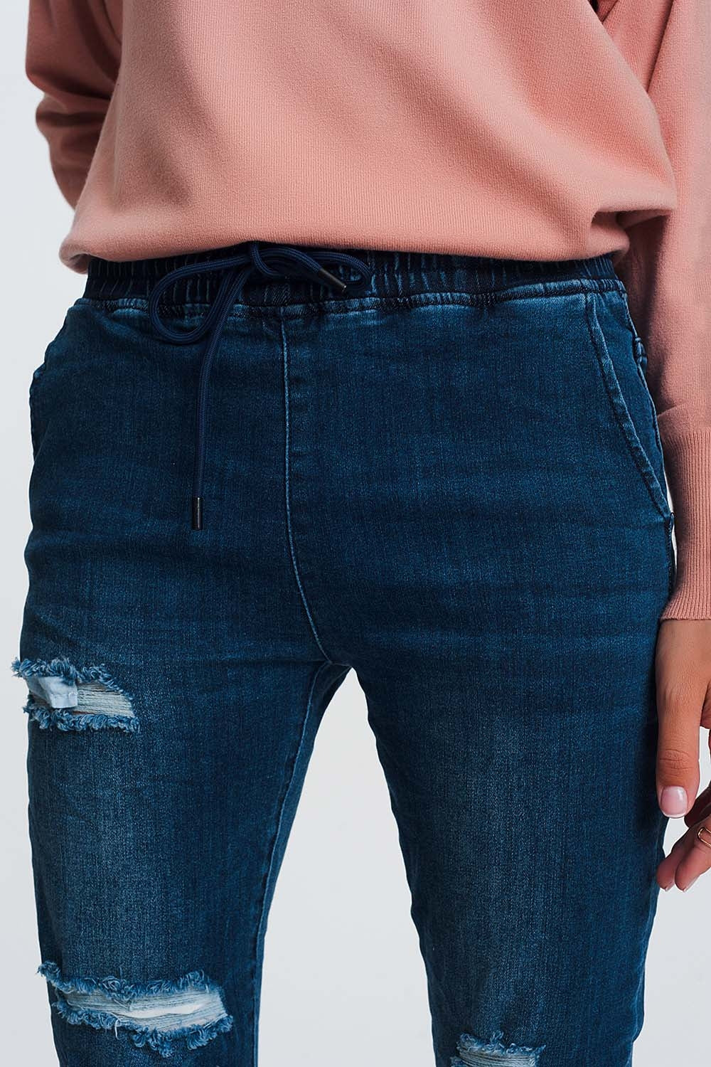 Calças de ganga estilo joggers em azul escuro