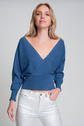 Camisola de malha com gola em V envolvida em azul