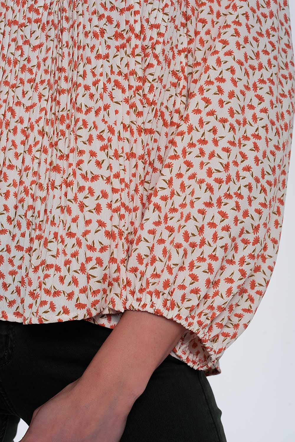 Top floral coral com decote quadrado e mangas insufláveis