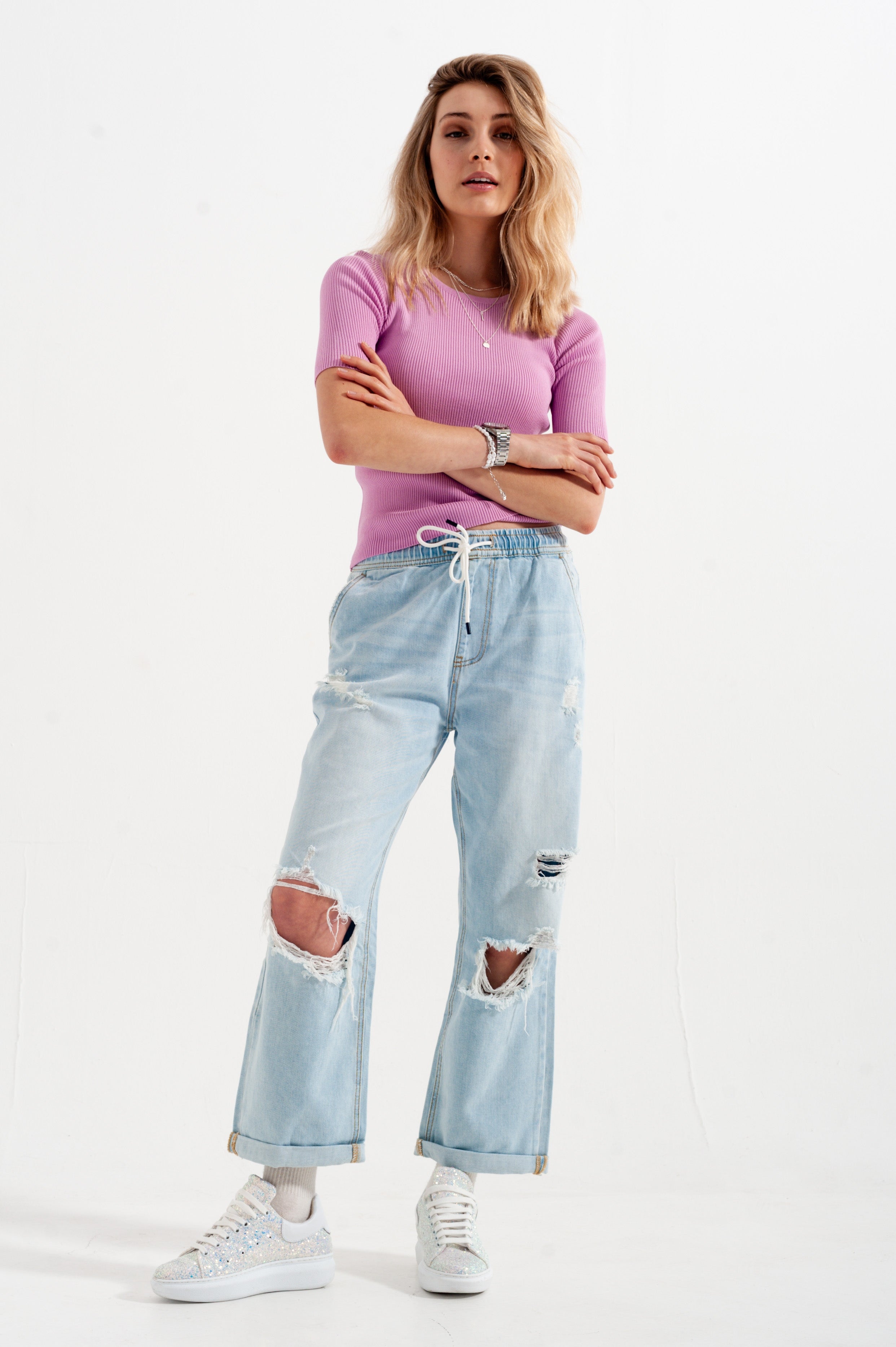 Camisola rosa trabalhada com nó nas costas