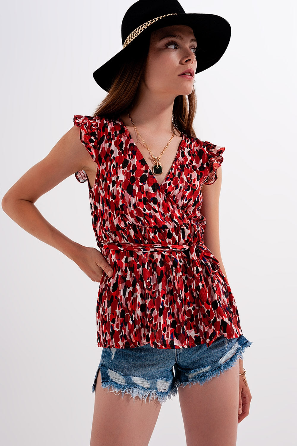 Blusa chiffon de impressão animal com detalhe de rufos