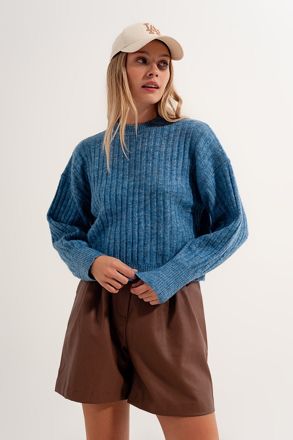 Camisola de malha quadrada azul com pedaços