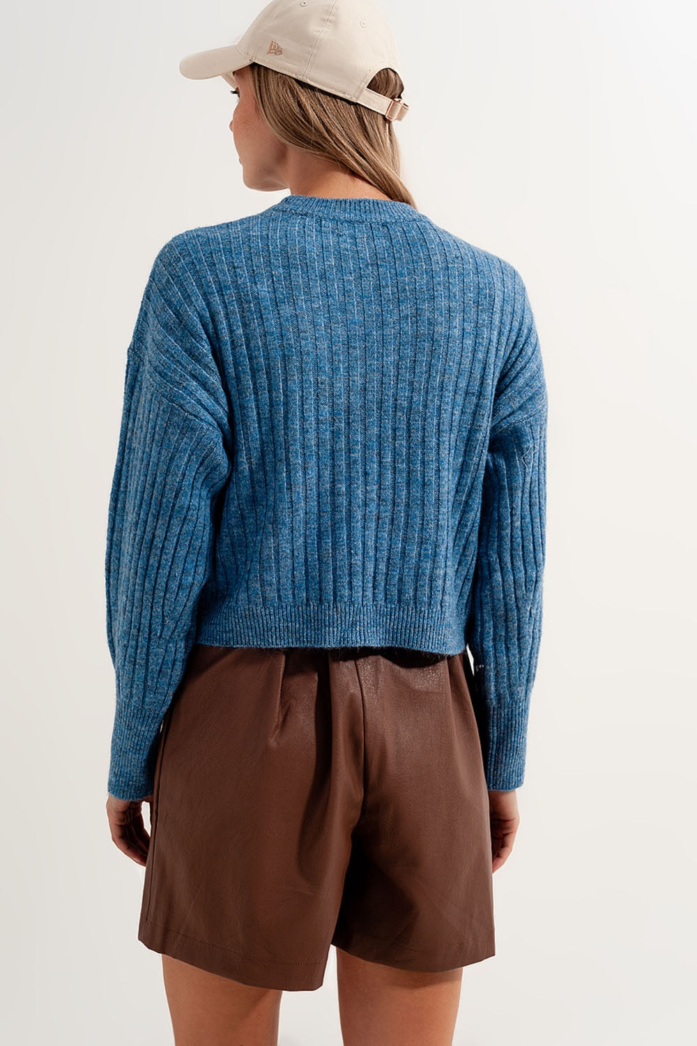 Camisola de malha quadrada azul com pedaços