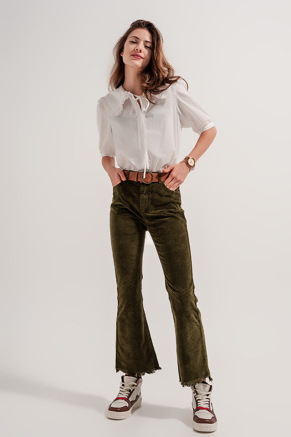 Calça flare de veludo cotelê verde