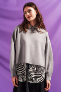 Camisola cinzenta curto com mangas de morcego