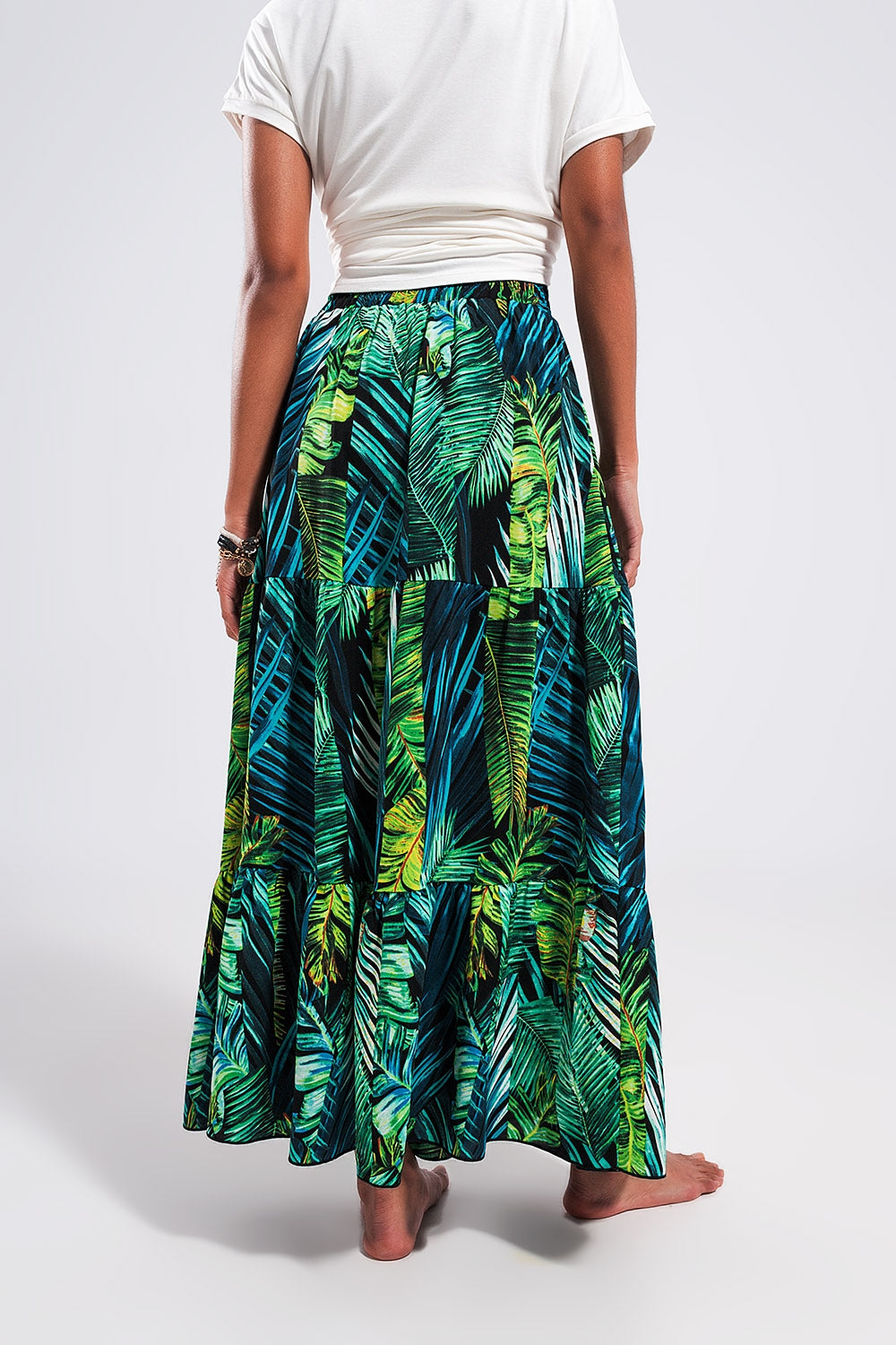 Saia longa em verde com estampas tropicais
