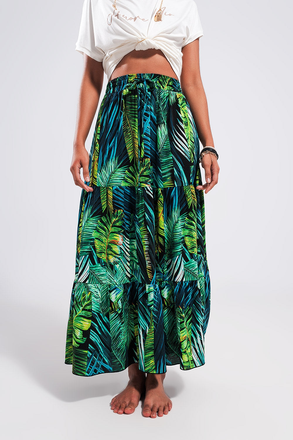 Saia longa em verde com estampas tropicais