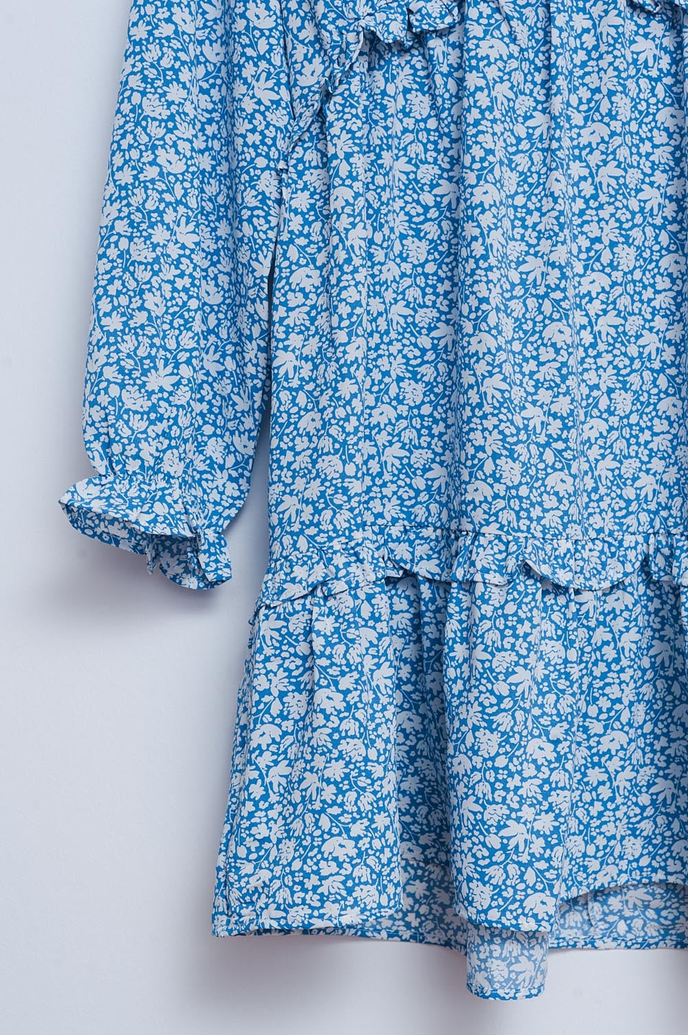 Vestido de tarde curto azul com costas abertas e estampado floral