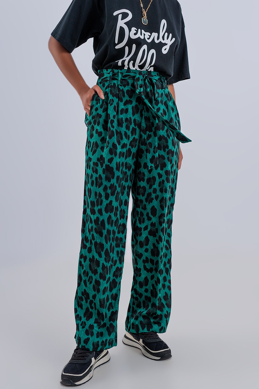 Calças de fundo largo em verde leopardo