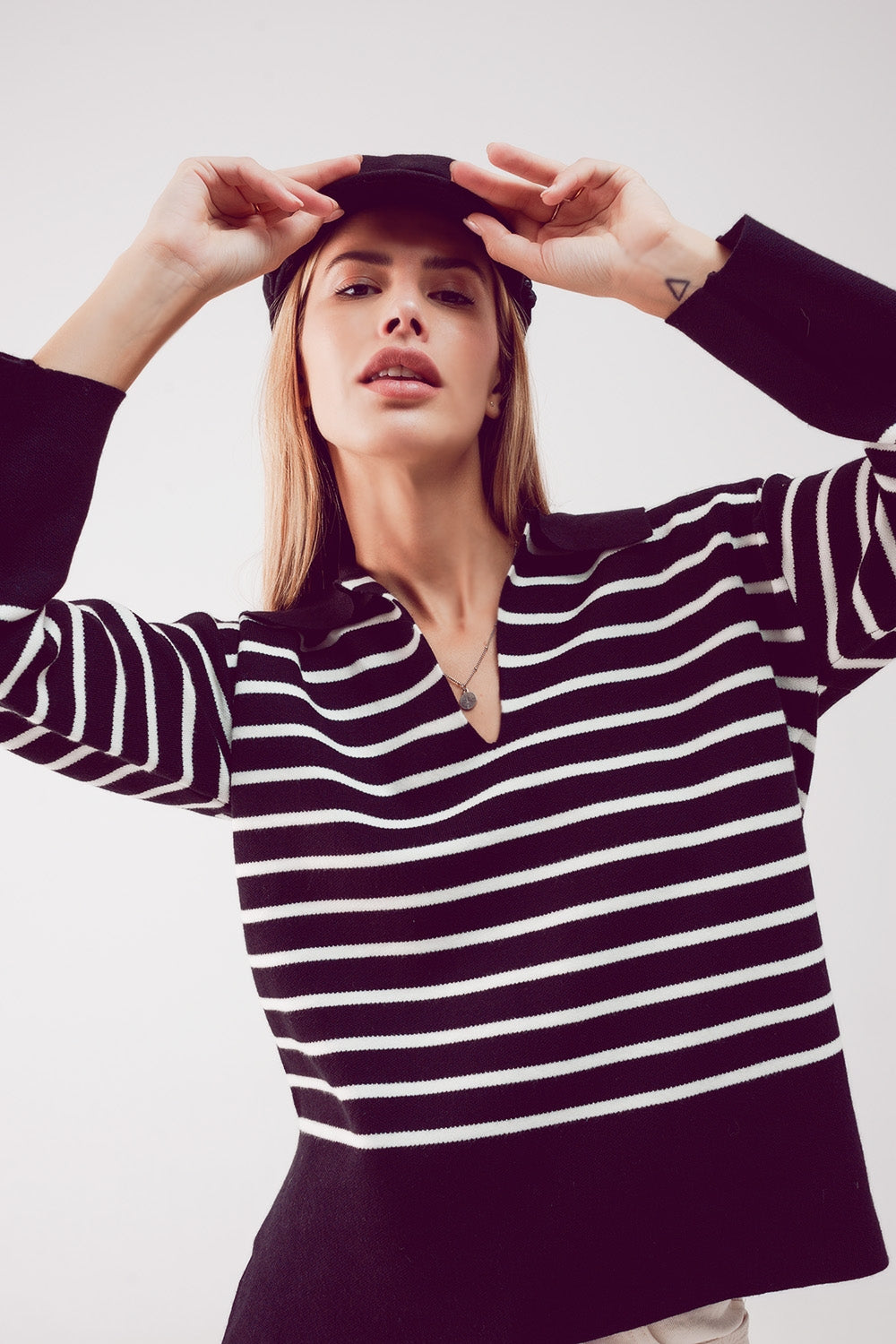 Camisola de pescoço polo listrado preto