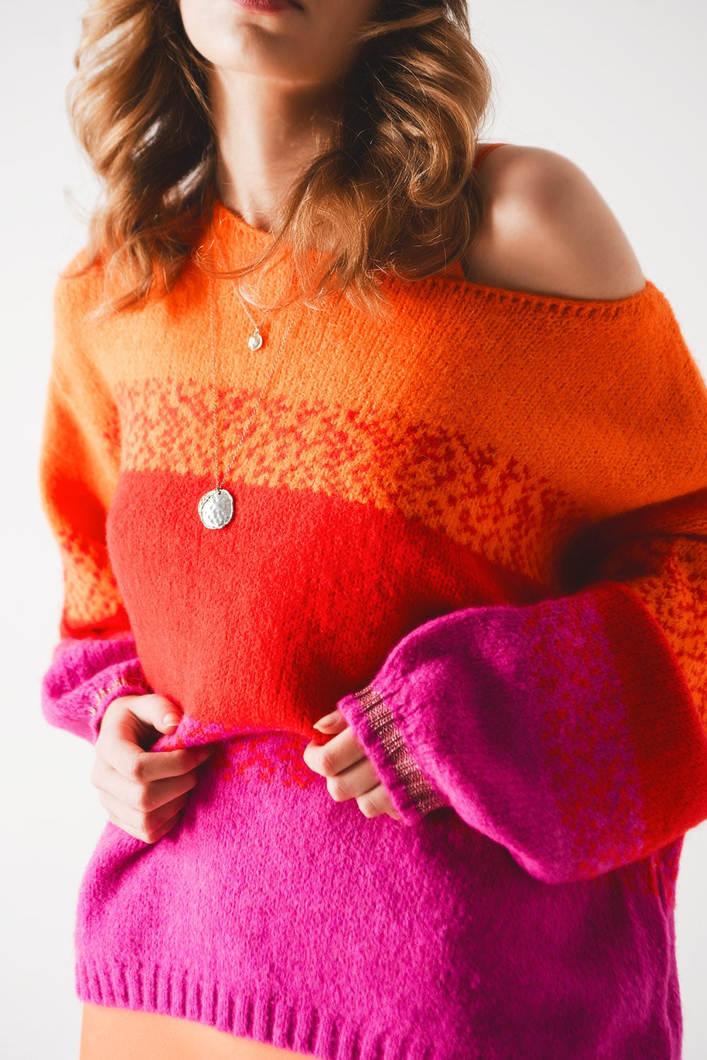 Camisola de malha laranja com riscas mélange