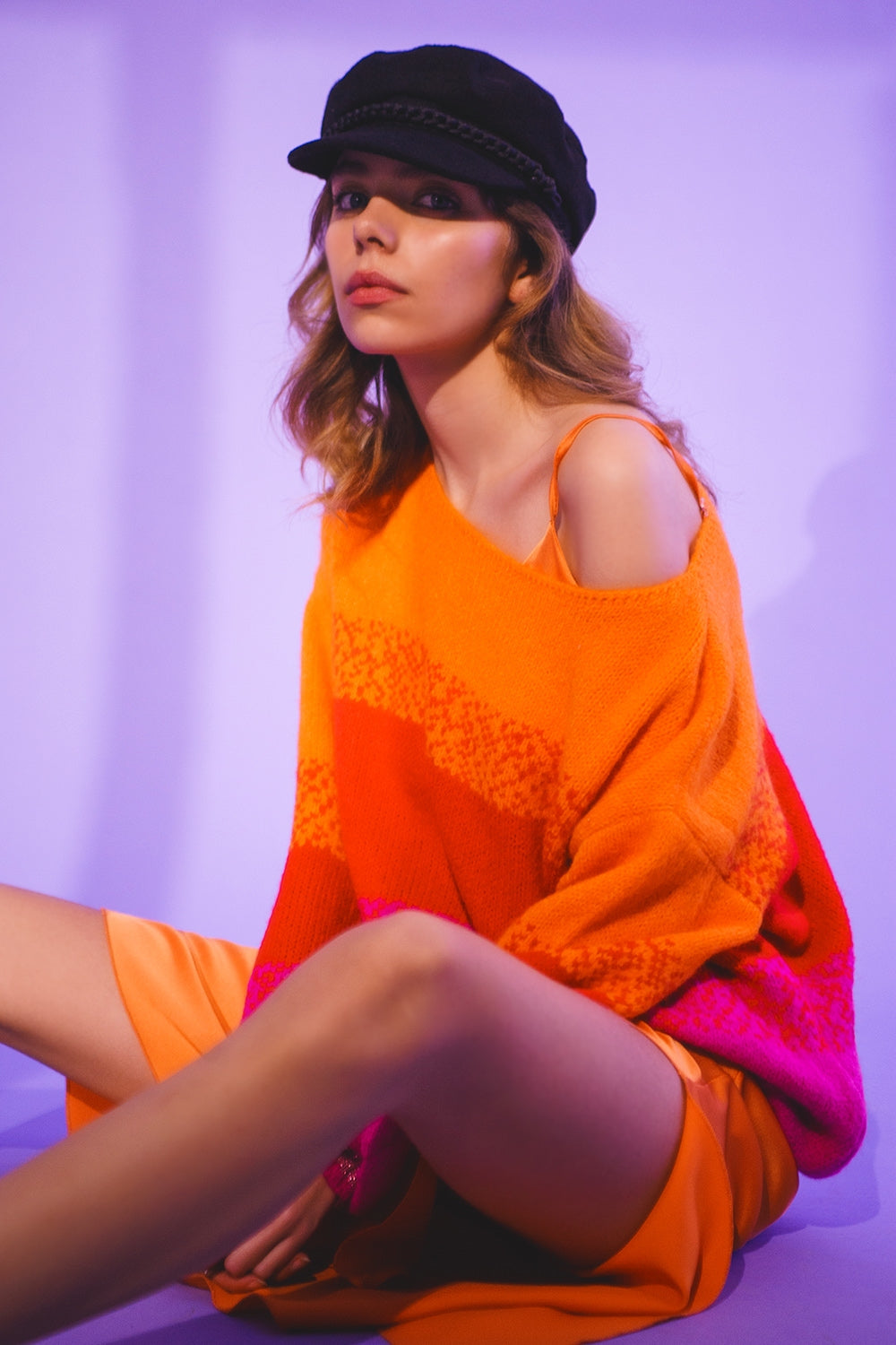 Camisola de malha laranja com riscas mélange