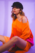 Camisola de malha laranja com riscas mélange