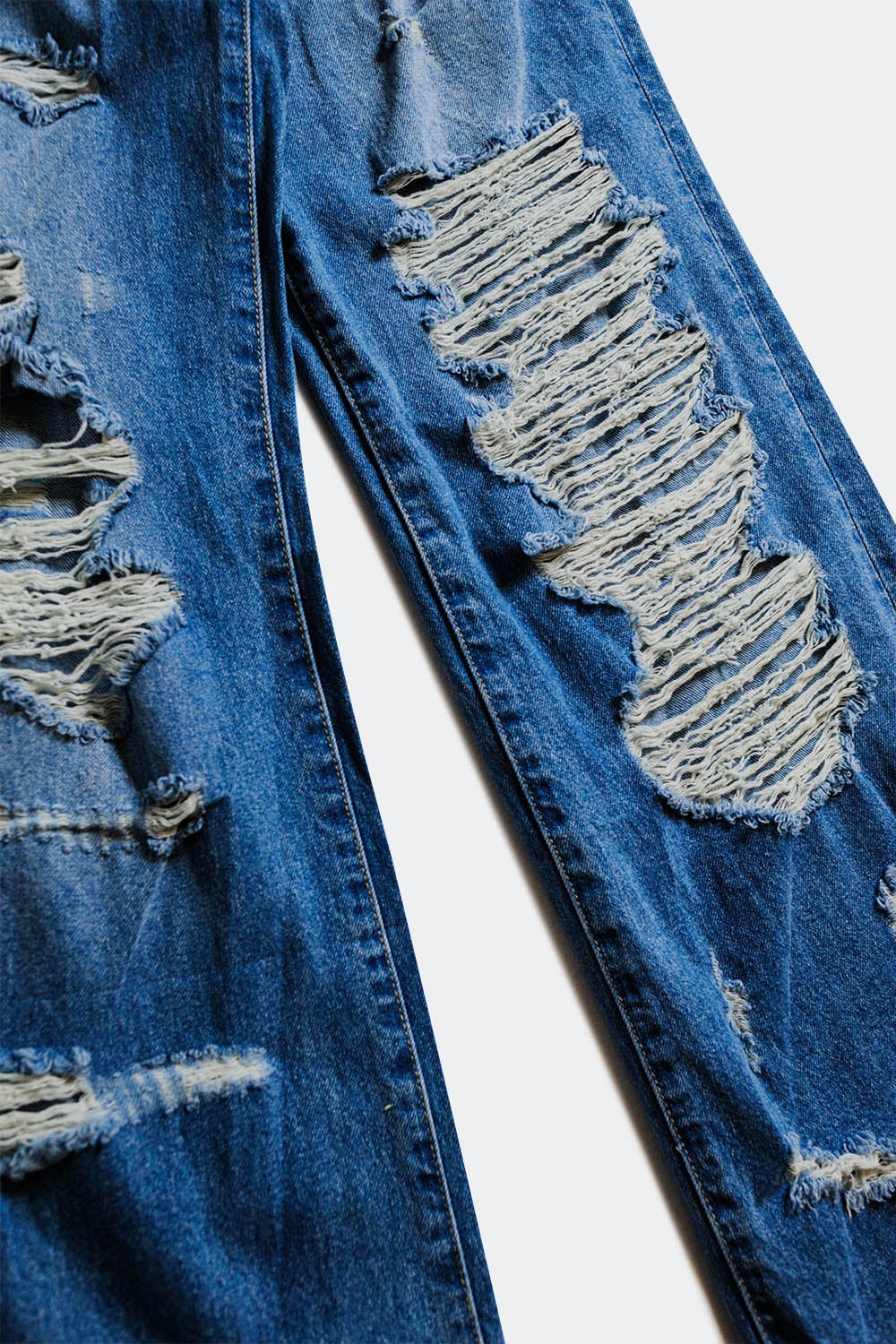 jeans boyfriend destruído em azul