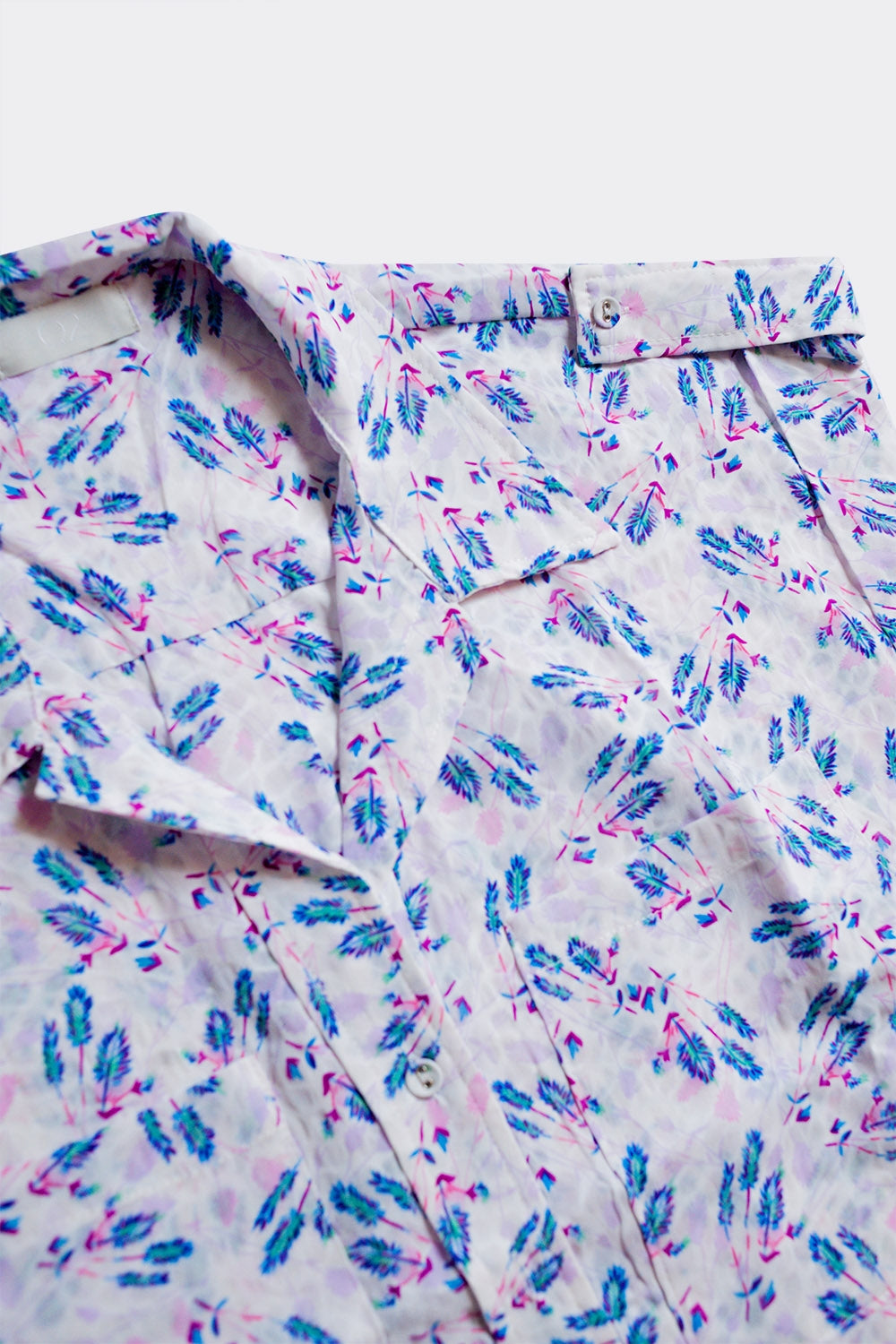 Blusa lilás com bolsos e estampa floral