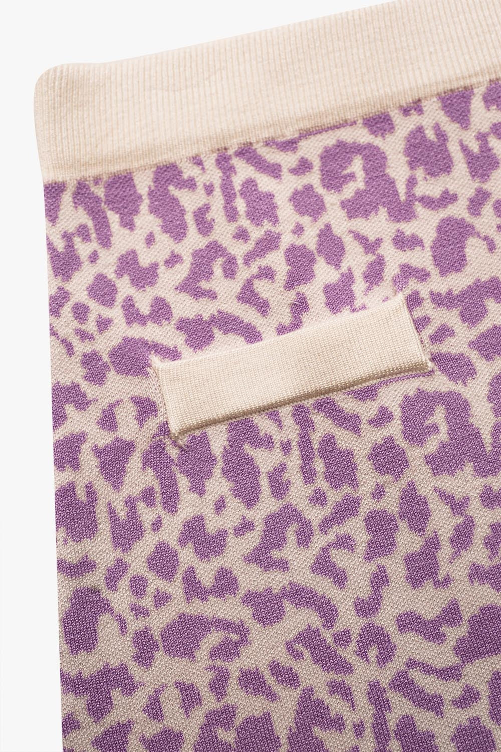 Mini saia de malha fina em estampado lilas