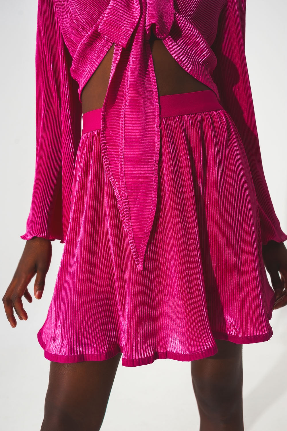 Saia curta plissada em Fuchsia