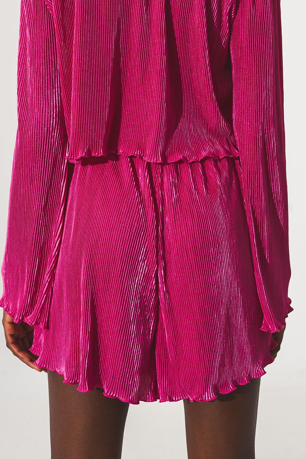 Shorts plissados em fuschia