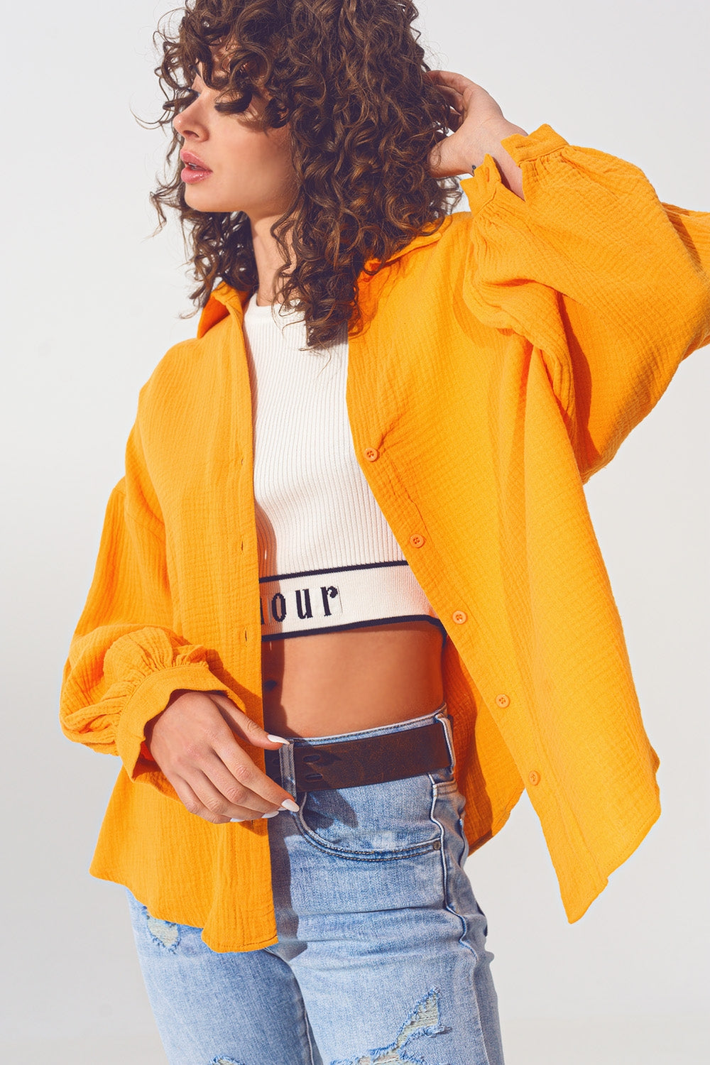 Camisa solta com textura em laranja