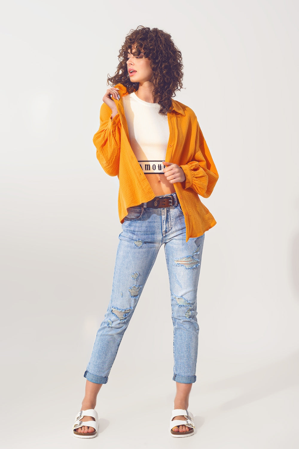 Camisa solta com textura em laranja