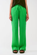 Calça listrada folgada em verde