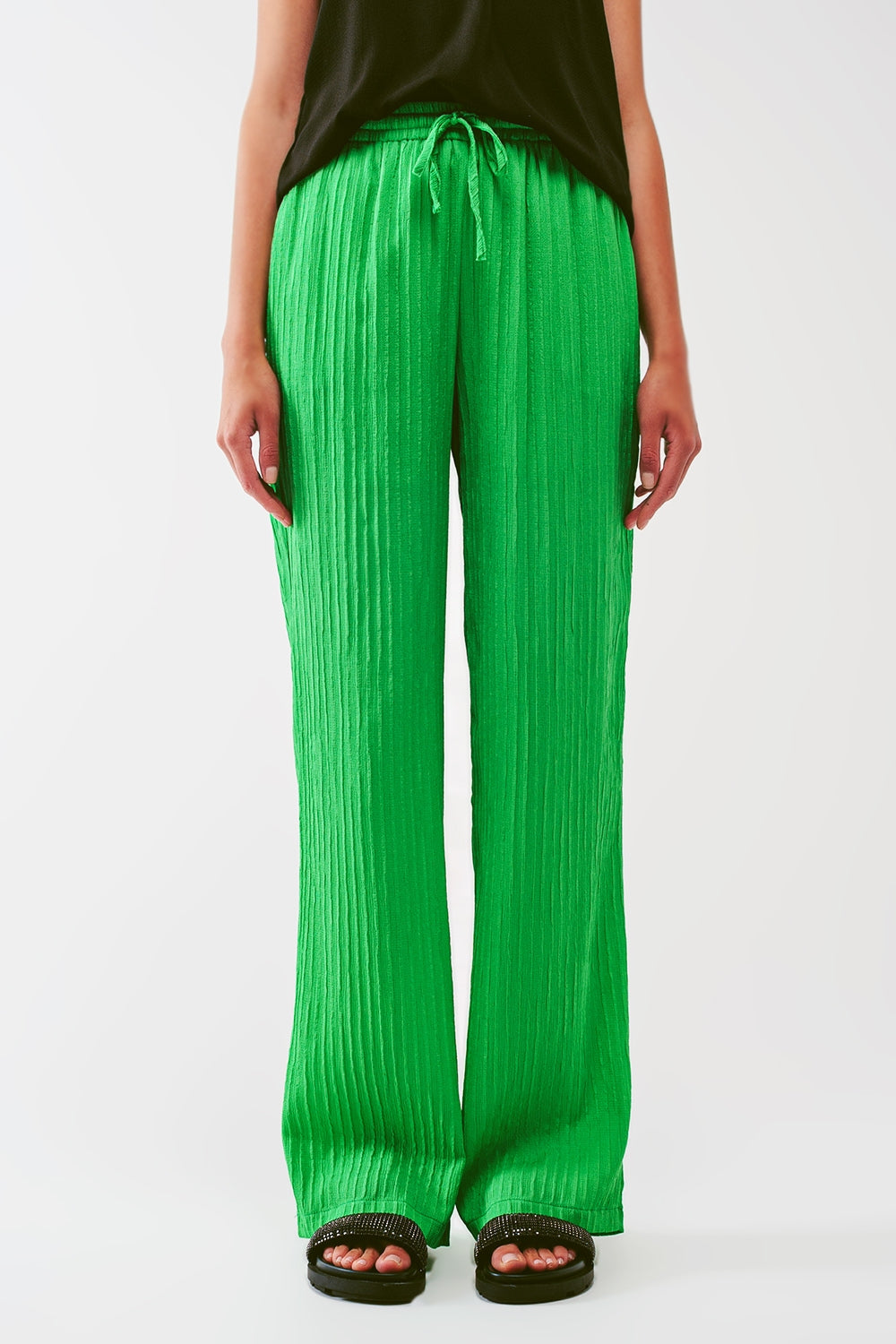 Calça listrada folgada em verde