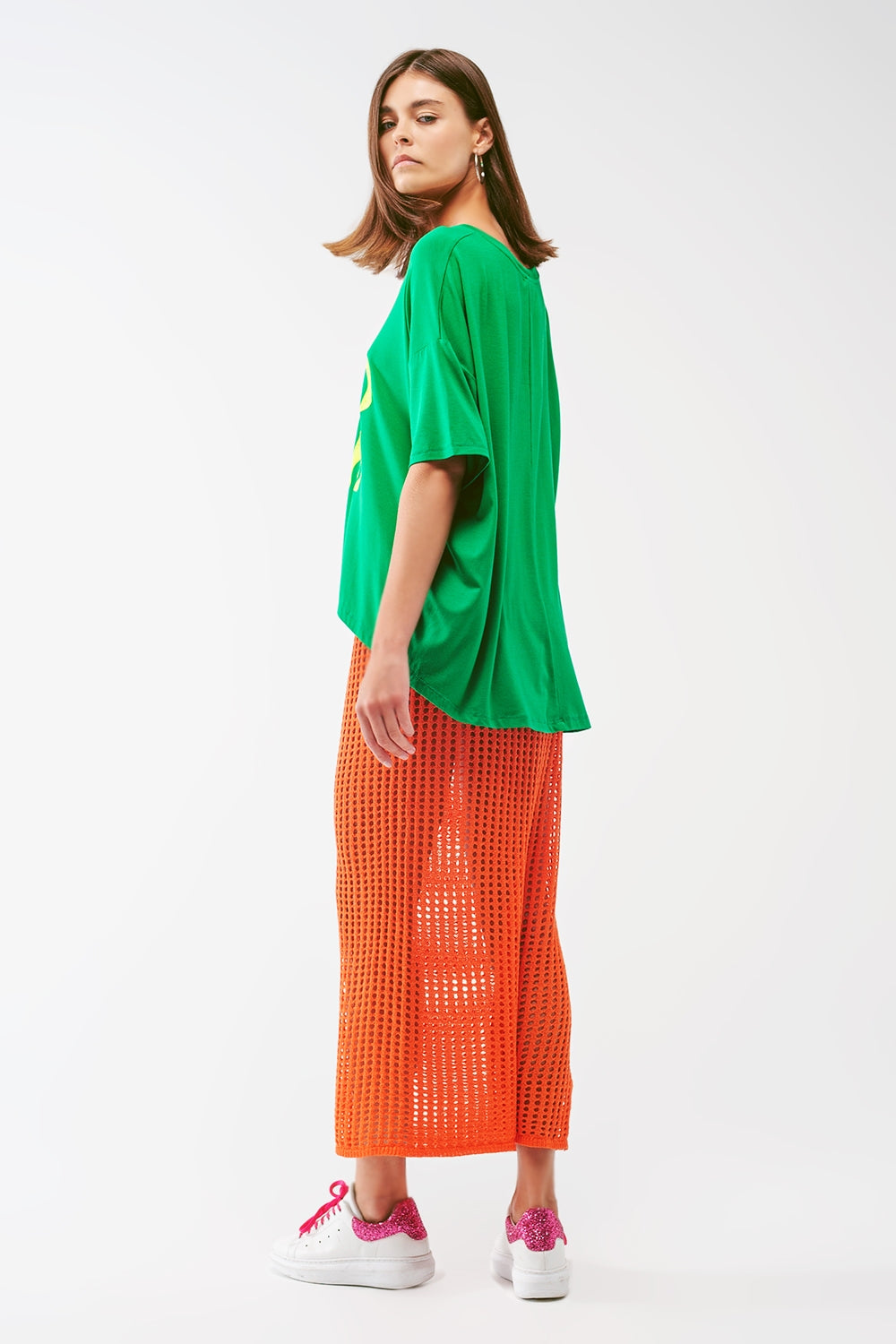 Saia maxi em crochê transparente na cor laranja