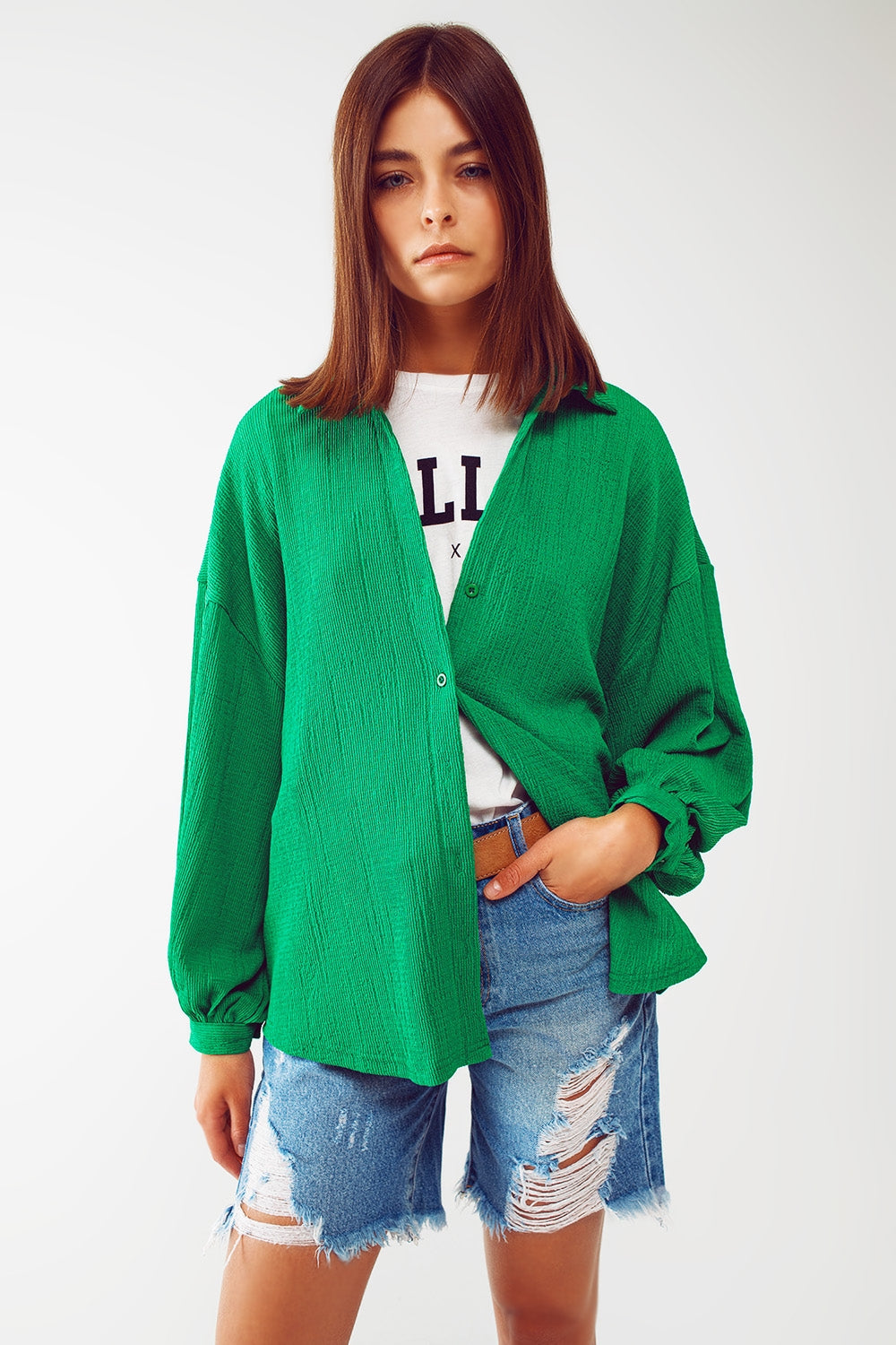 Camisa com textura e mangas bufantes em verde