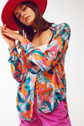Camisa de cetim com estampa floral em laranja