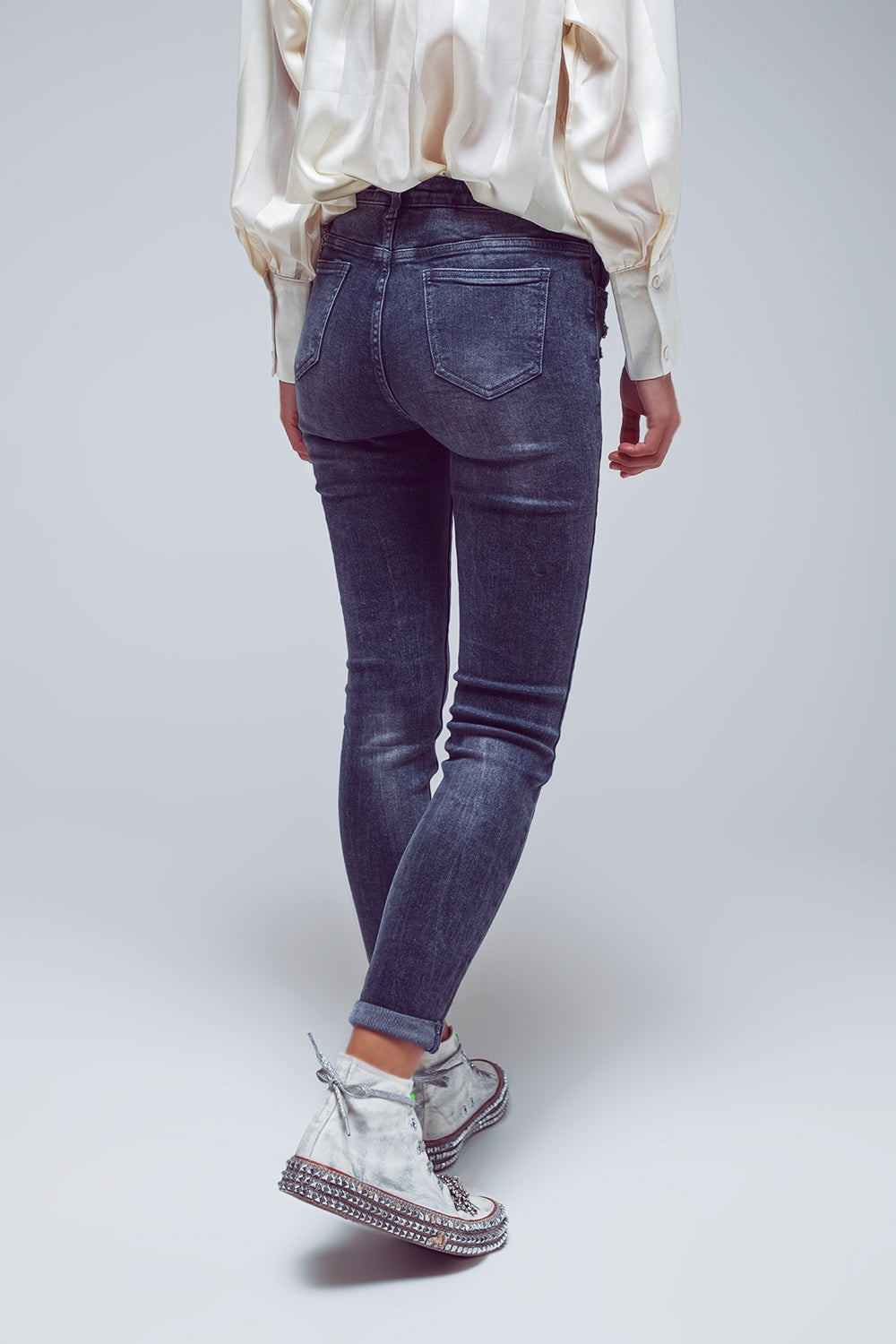 Calças Skinny Fit Escuras Rasgadas