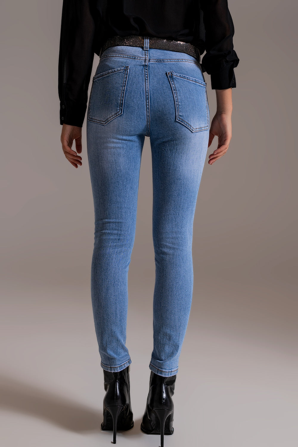 Calças de ganga skinny cintura alta em lavagem clara
