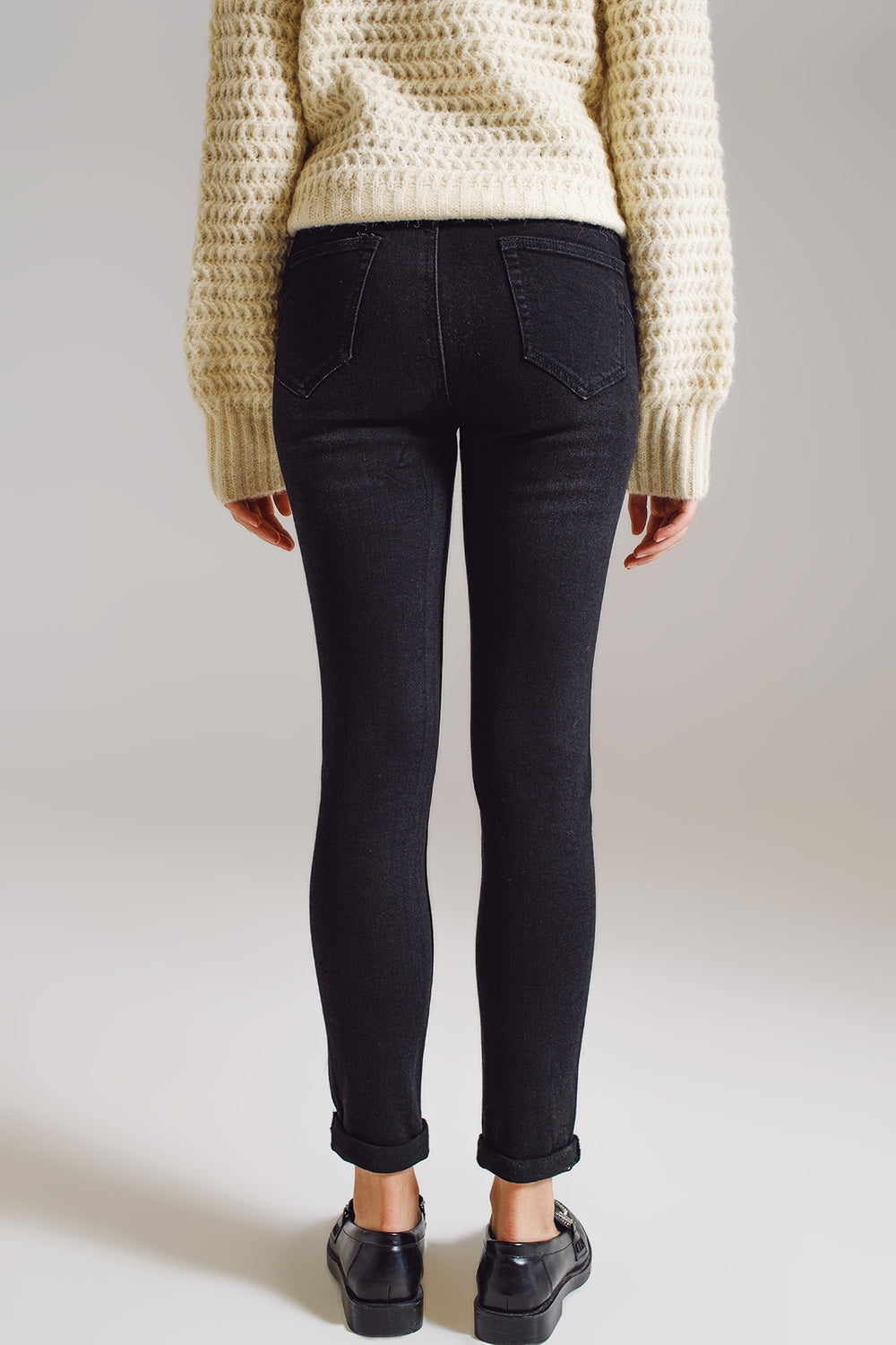 Calças de ganga skinny com apliques de strass em preto