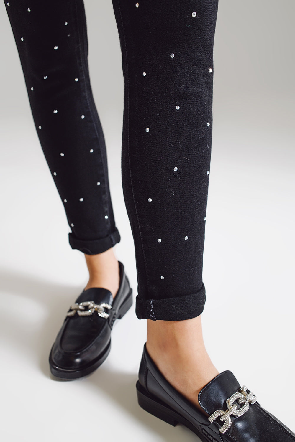 Calças de ganga skinny com apliques de strass em preto