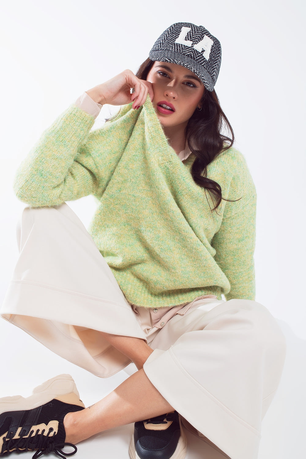 Camisola de malha fofa verde com decote em V