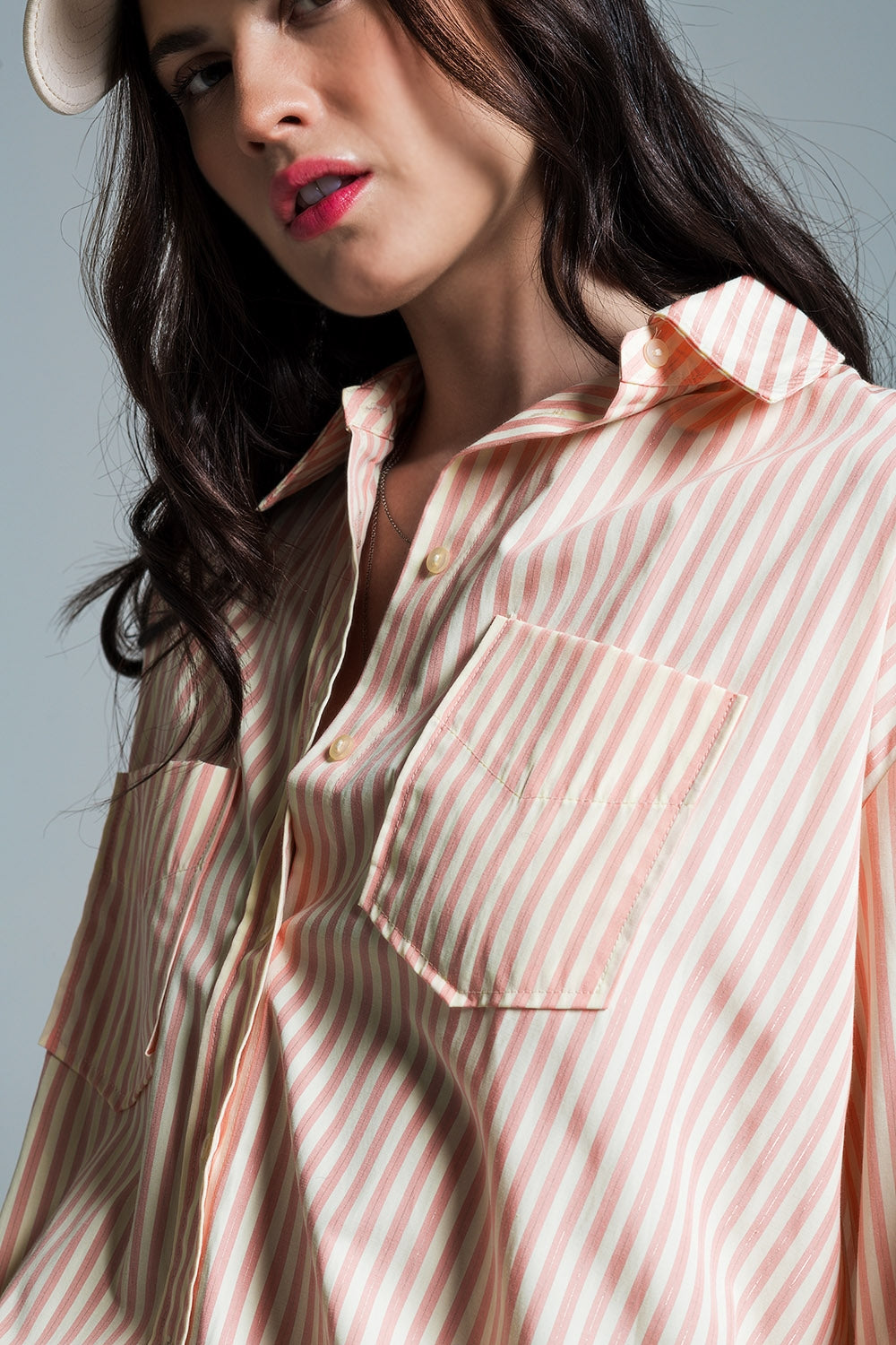 Blusa oversized laranja clara com riscas brancas