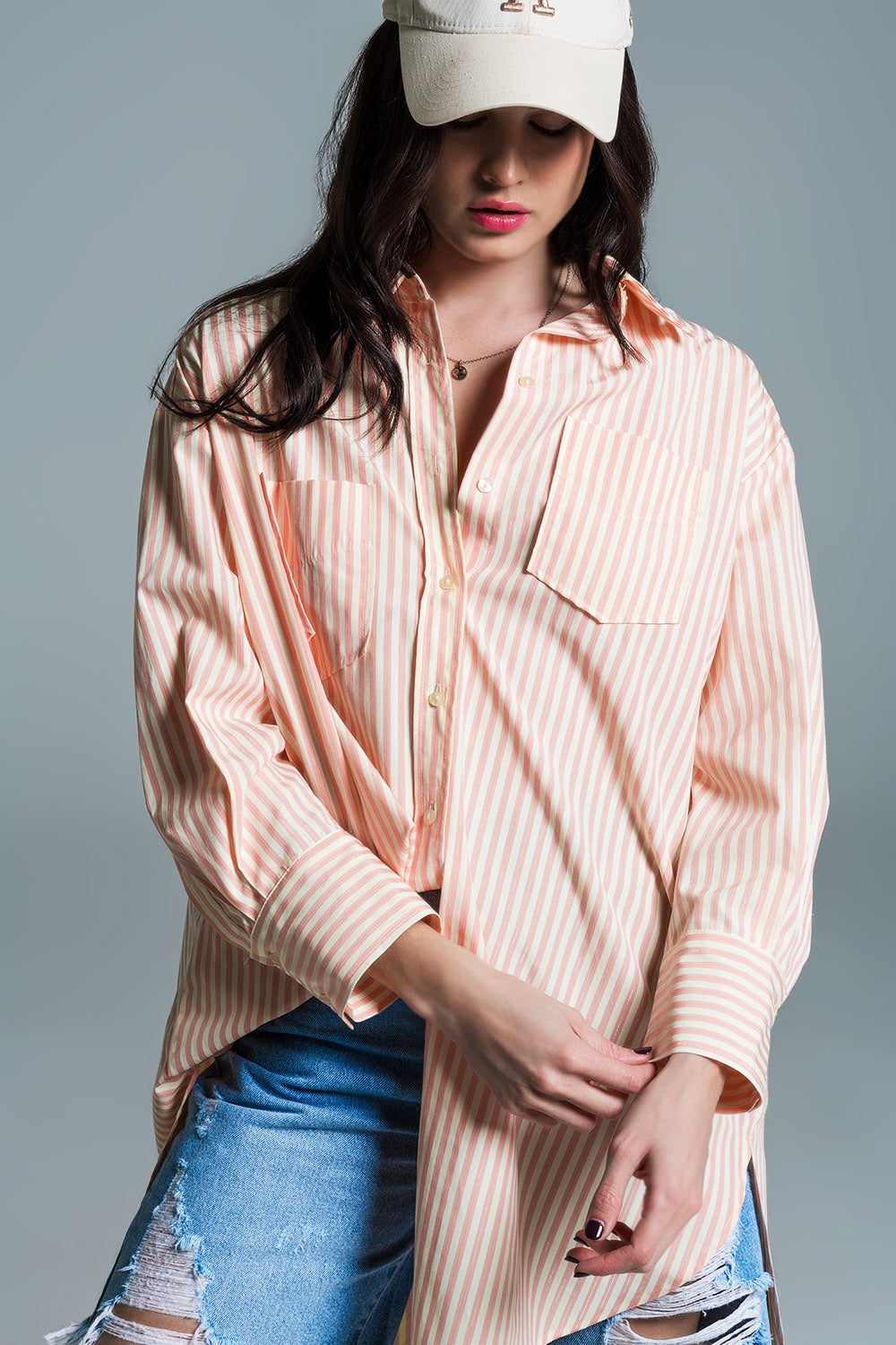 Blusa oversized laranja clara com riscas brancas