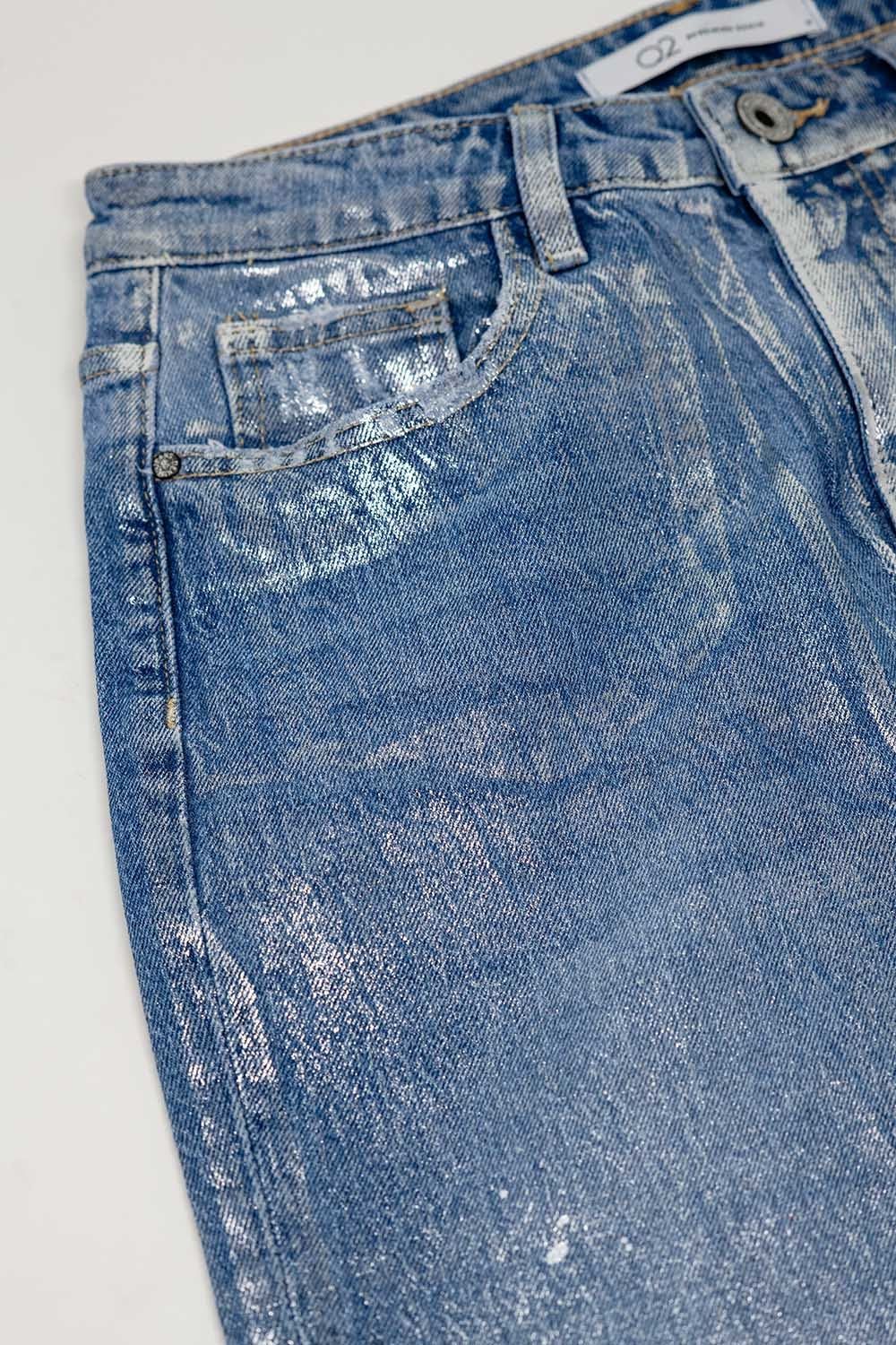 Calças de ganga azuis skinny com acabamento metálico em lavagem clara