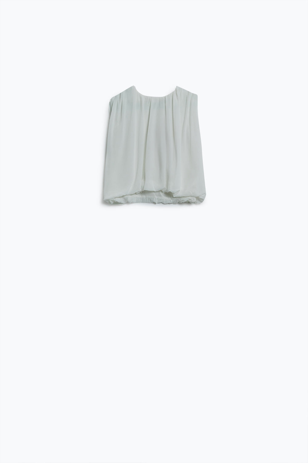 Top de musselina branca com design de pregas