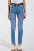 Calças de ganga skinny em azul lavado com strass na parte da frente