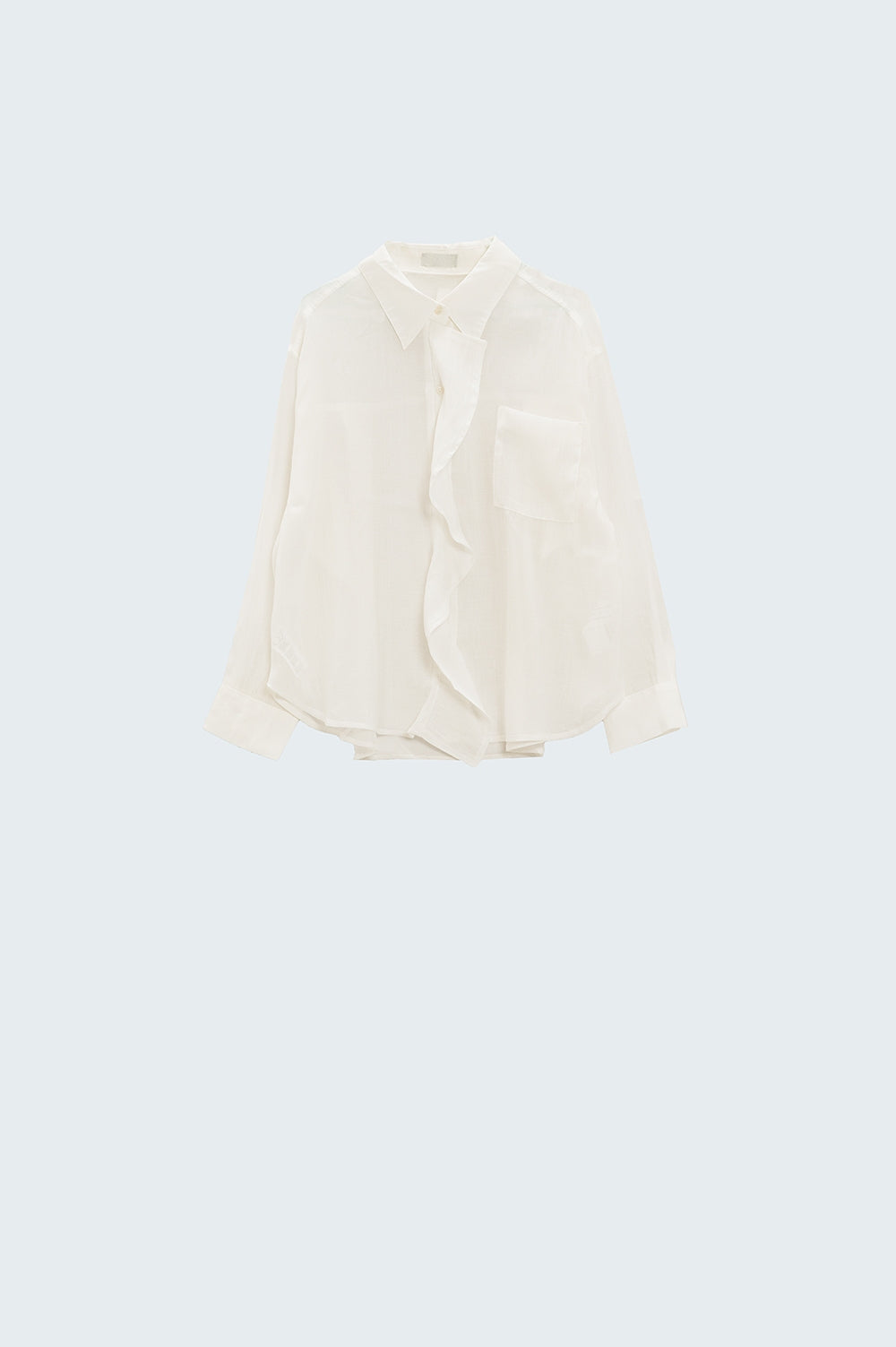 Blusa branca semi-transparente com pormenor de folhos na frente