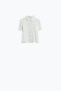 Camisa pólo croché branca com fecho de botões
