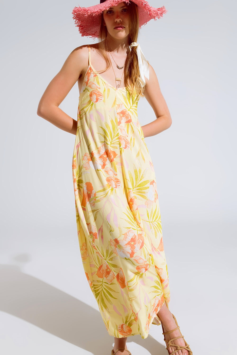 macacão maxi amarelo com estampado tropical