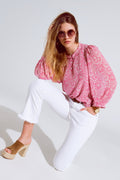 Blusa de chiffon cor-de-rosa com estampado floral e mangas compridas em balão