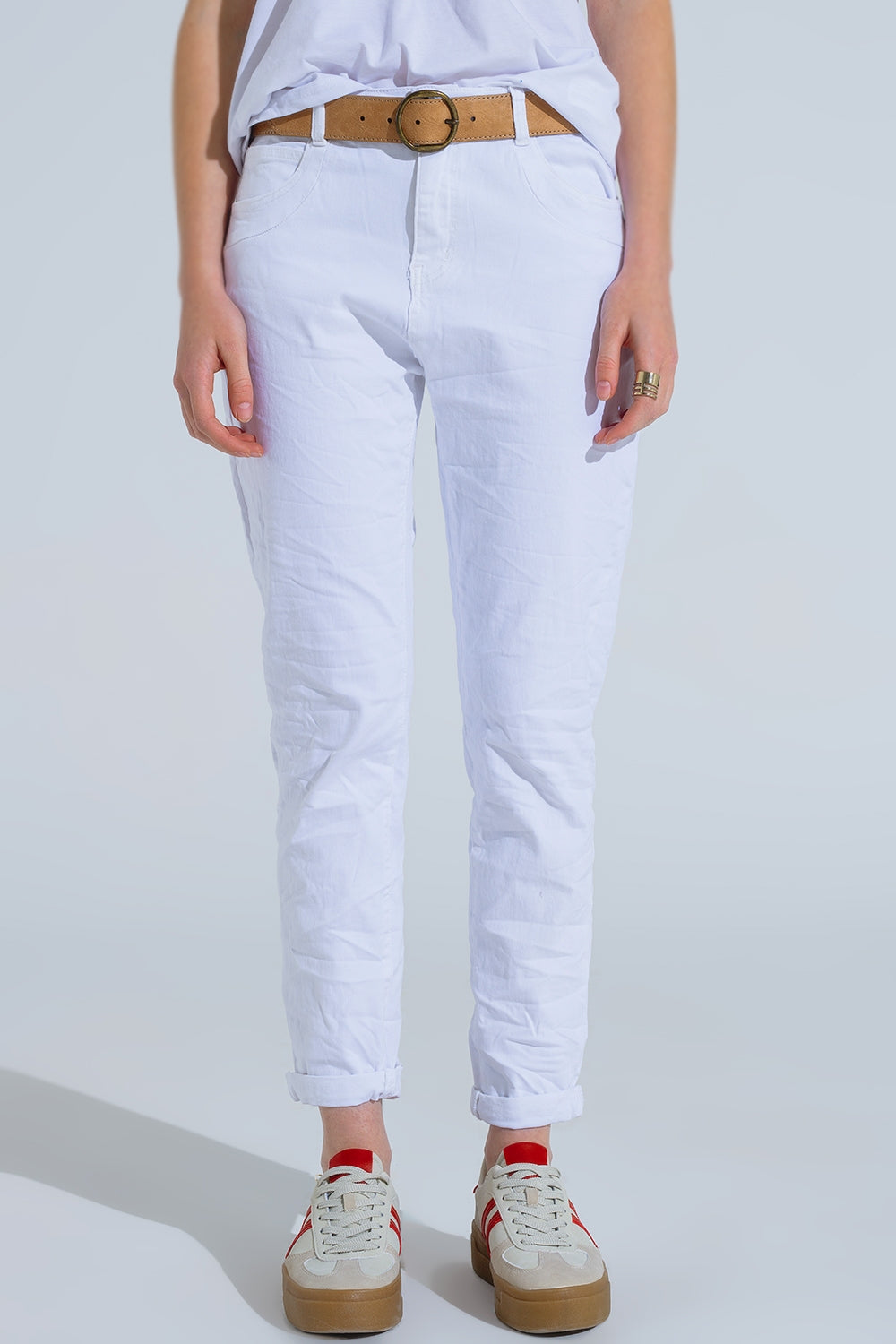 Calças de ganga skinny brancas com vincos