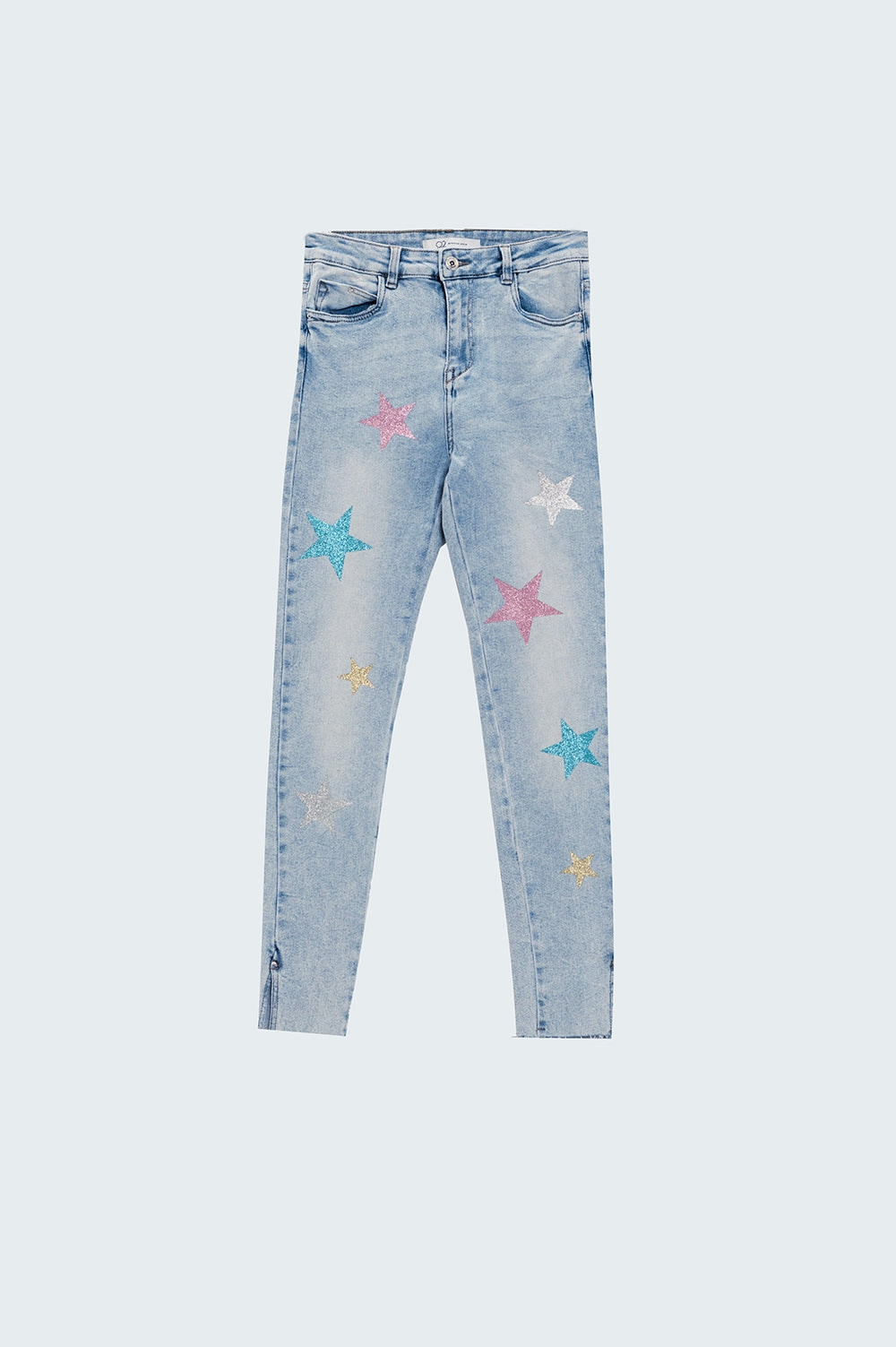 Calças de ganga skinny de lavagem clara com estrelas nas pernas