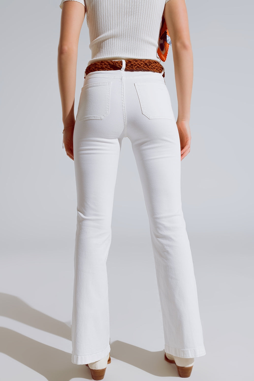 Calças de ganga skinny brancas com pormenor de bolso à frente