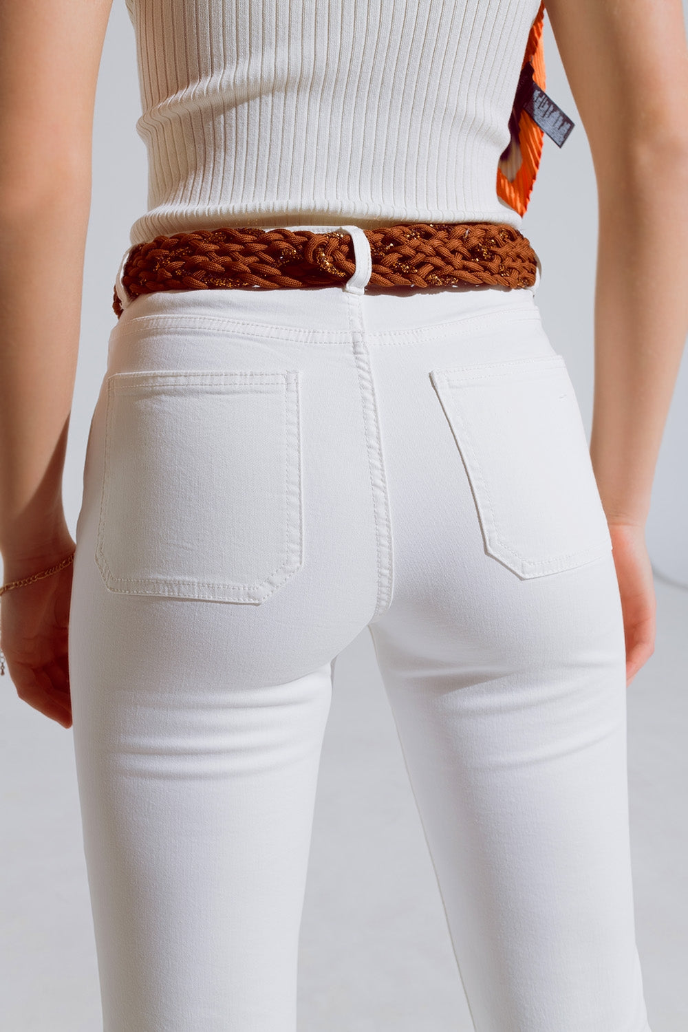 Calças de ganga skinny brancas com pormenor de bolso à frente