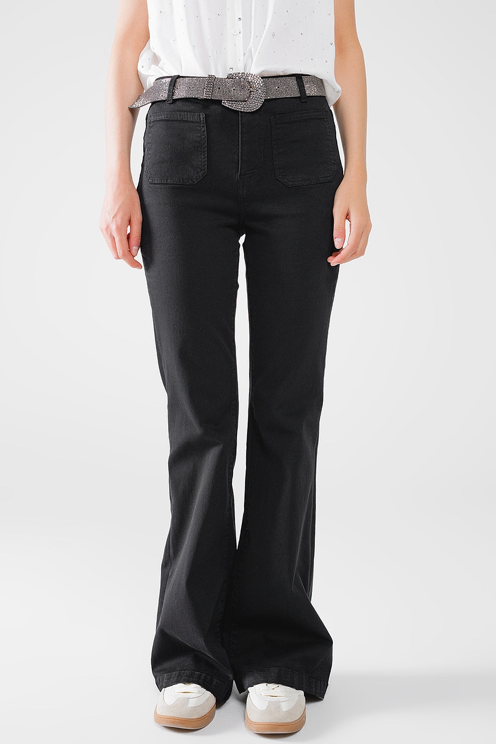 Calças de ganga skinny pretas com pormenor de bolso à frente
