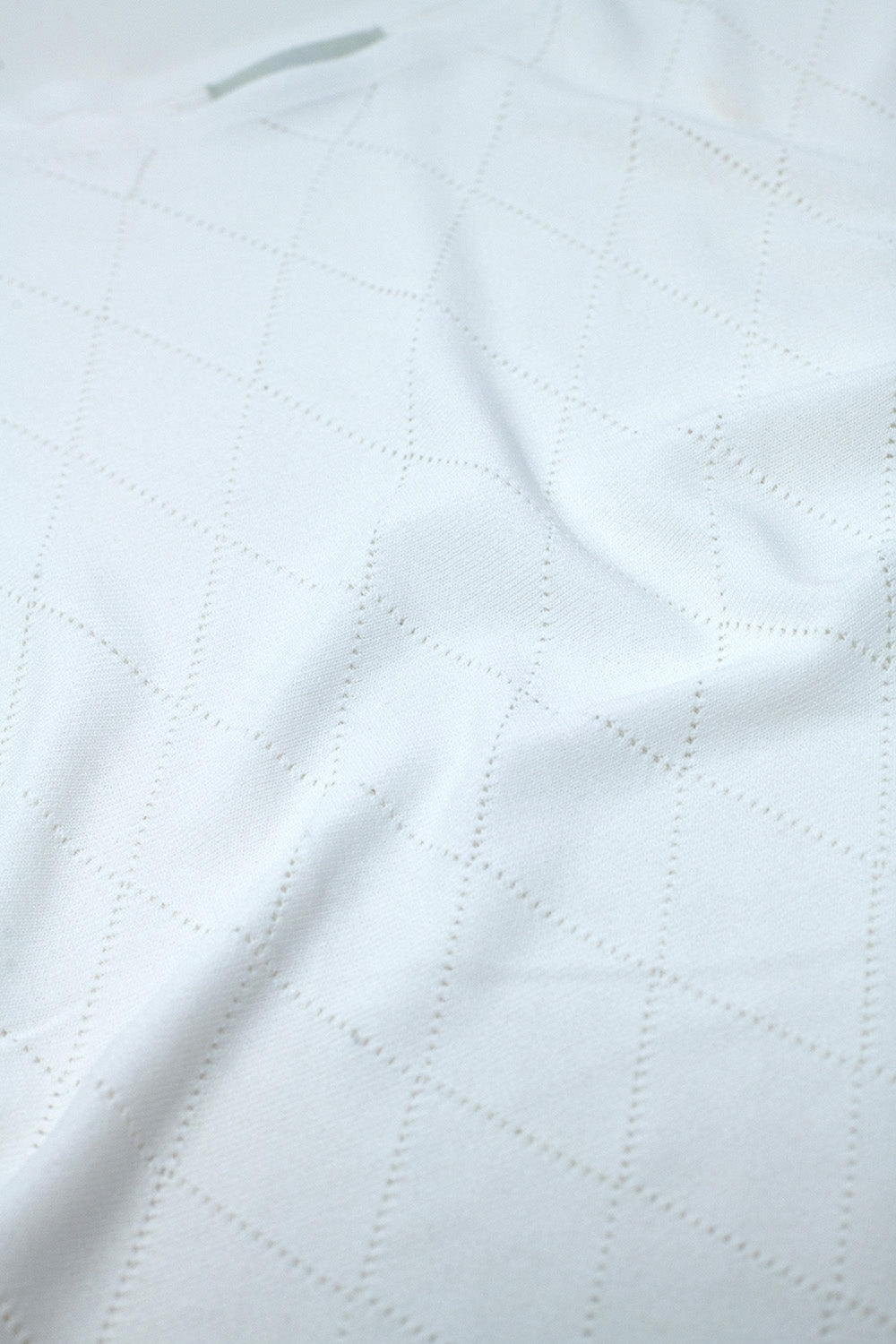 Camisola branca com estampado Argyle e gola boat