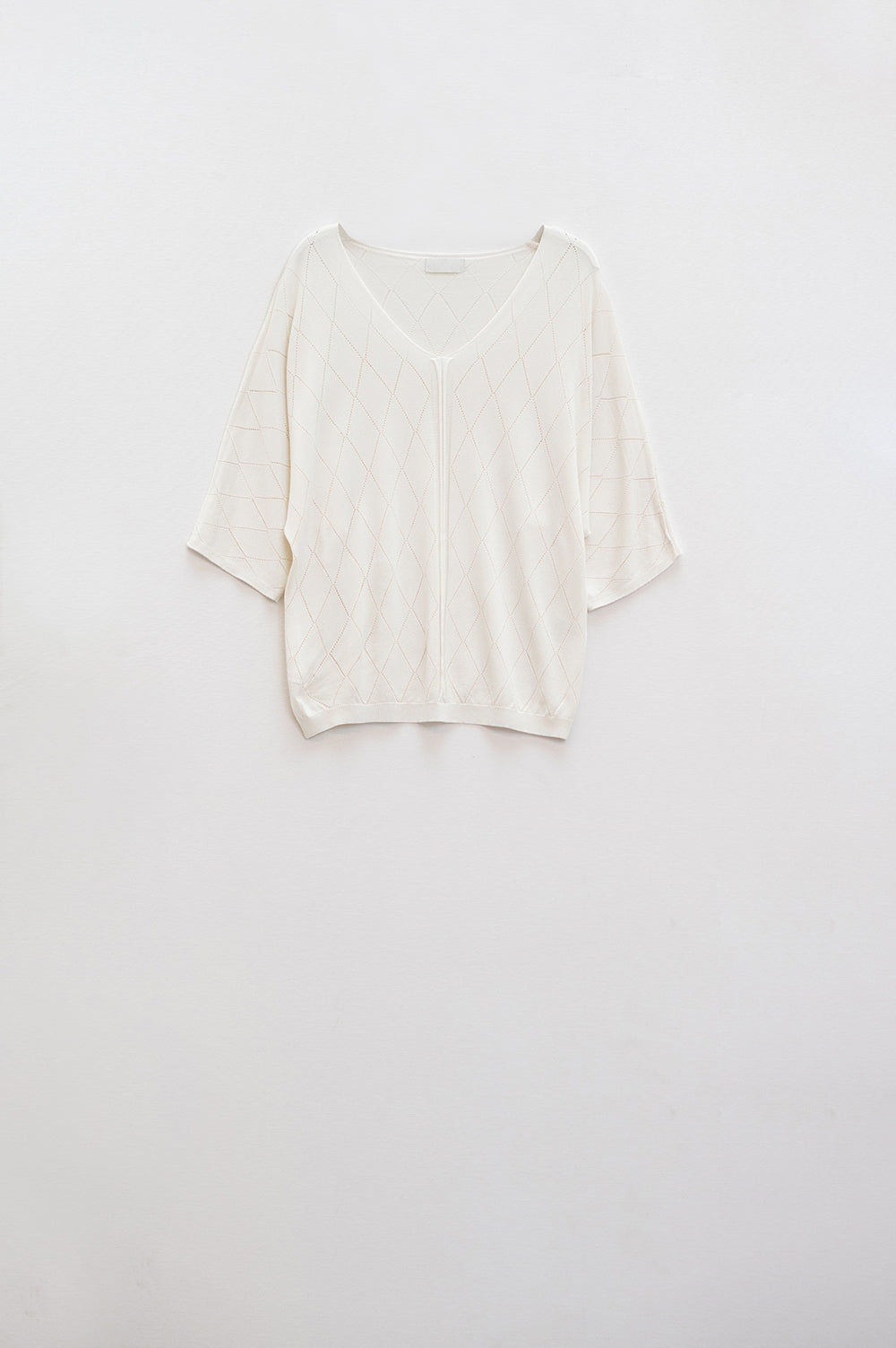 Camisola de manga curta beige com padrão Argyle